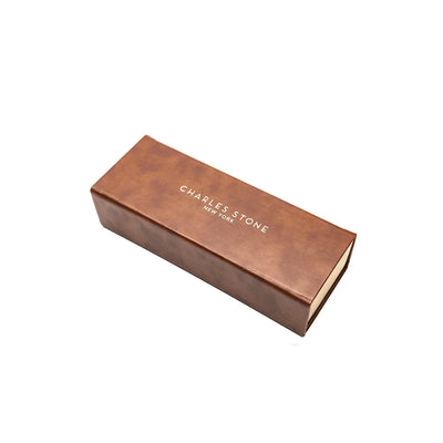 Charles Stone eyeglasses case, elegant brown design with logo, perfect for protecting your eyewear.