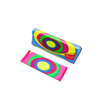 Colorful Kaos eyewear case and cloth featuring vibrant circular patterns in blue, pink, green, and yellow.