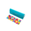 Colorful geometric eyeglasses case and microfiber cloth from Kxos, showcasing vibrant design and modern style.